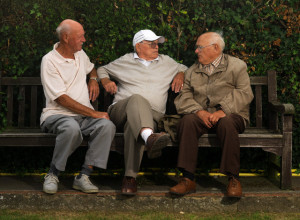 Three Senior Men on a Park Bench