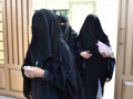 12 Dec 2015, Riyadh, Saudi Arabia --- (151212) -- RIYADH, Dec. 12, 2015(Xinhua) -- Women walk out of a polling station after casting their votes for municipal elections in Riyadh, Saudi Arabia, Dec. 12, 2015. More than 1.4 million people are eligible to vote, including 130,637 females who will be allowed to contest and cast ballots in the third municipal poll. It is Saudi Arabia's first elections open to women. (Xinhua/Wang Bo)(azp) --- Image by © Wang Bo/Xinhua Press/Corbis